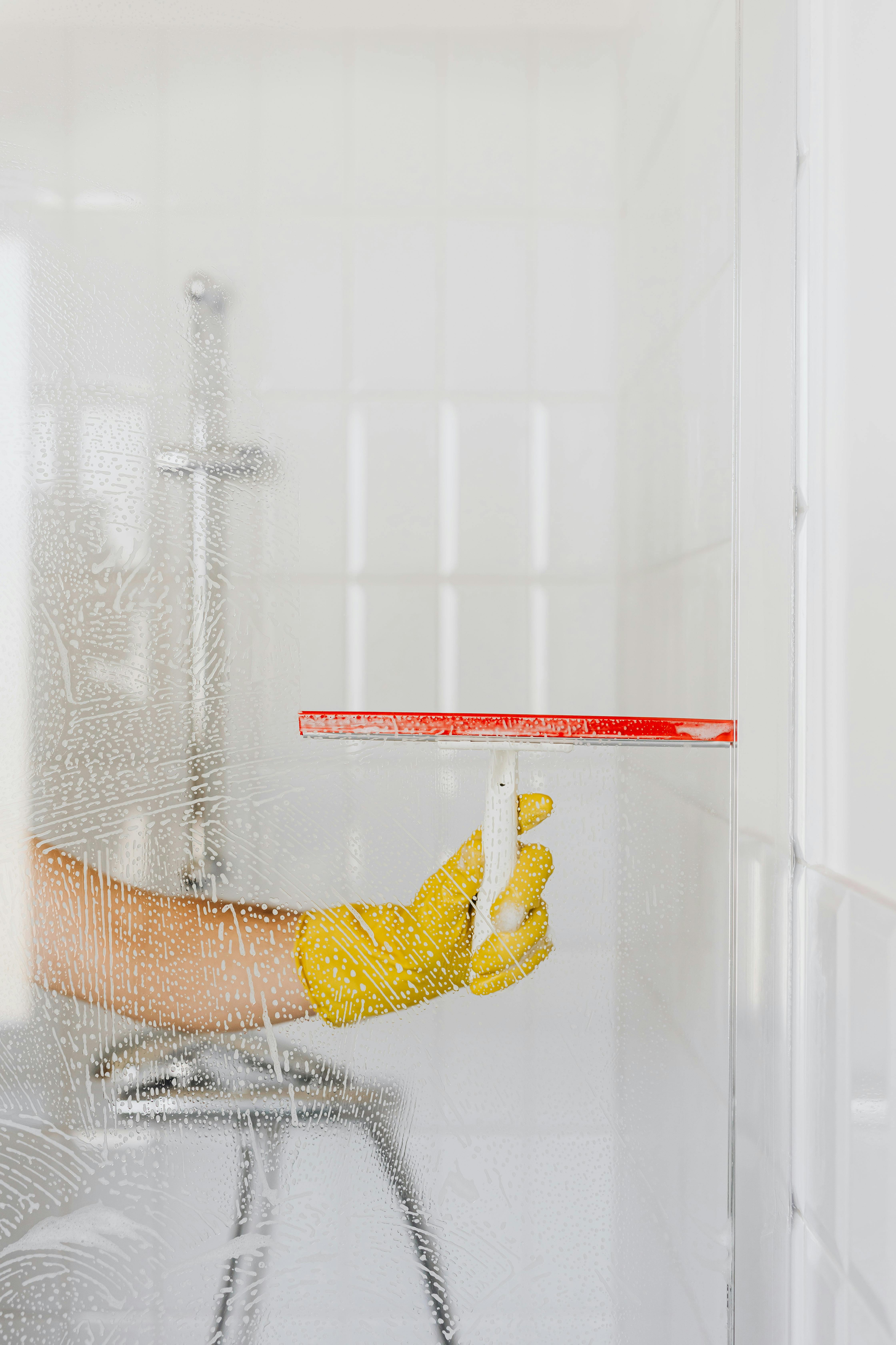 The Cleaners cleaning a window