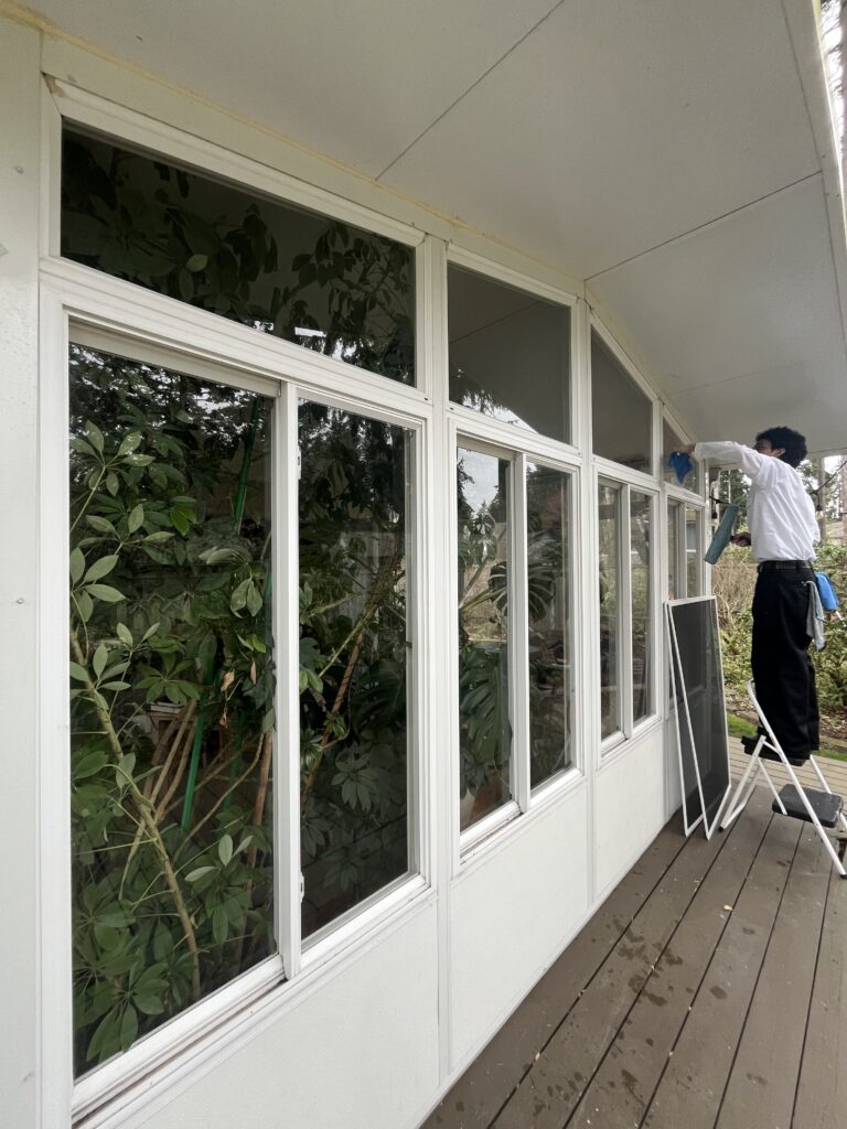 The Cleaners window cleaning taking care of frames for customer